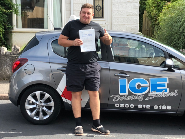 man next to car in devon after driving