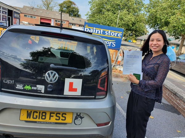 girl next to car in newton abbot