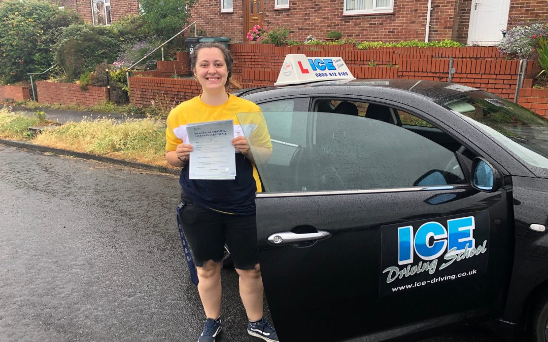 woman in yellow t shirt after newton abbot driving test