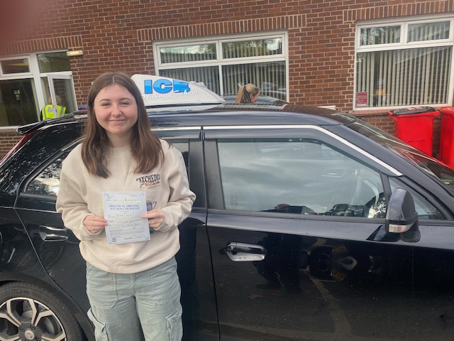 happy girl after driving tes pass newton abbot test centre