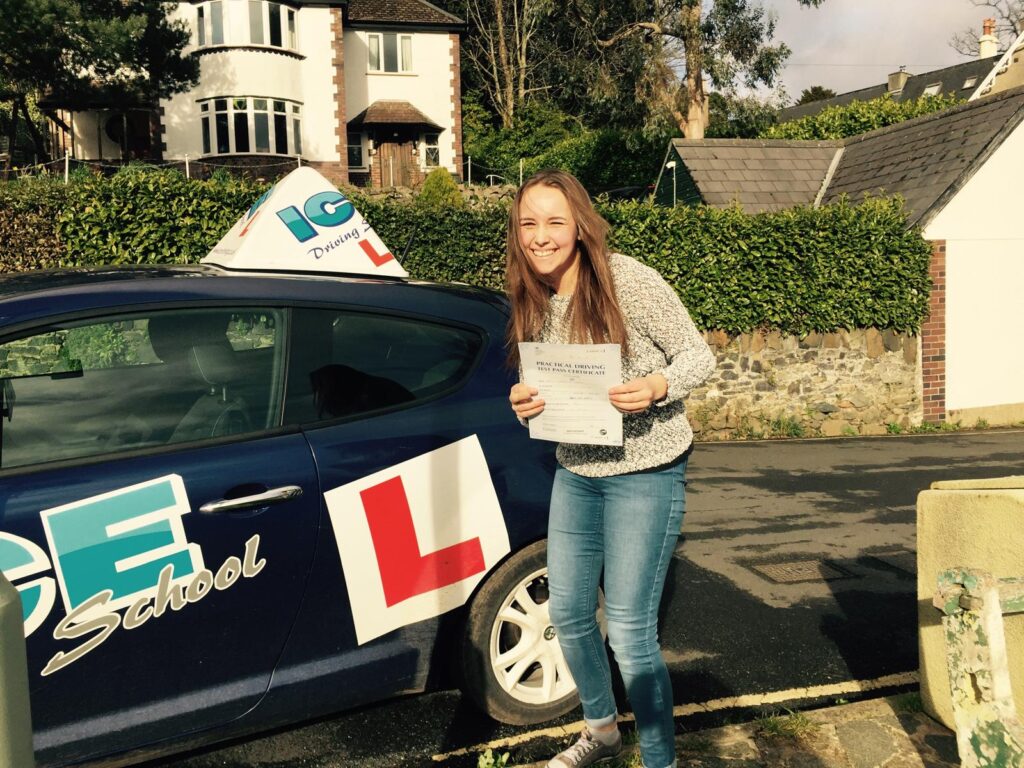 happy newton abbot driving lesson student after passing driving test in south devon